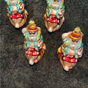 Macy's Colorful Santa Figurine Set